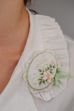 cross stitched brooch porcelain